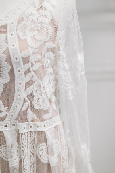Close-up of lace maternity dress from Client Closet