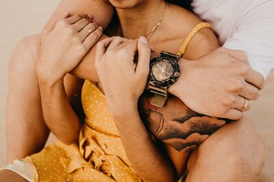 Couple holding each other close