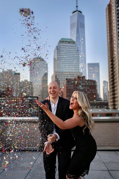 Engagement portrait confetti toss