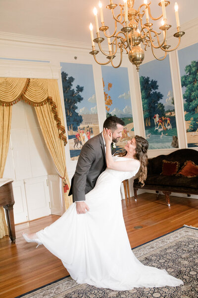 A first look between a bride and her dog at Airlie with Northern Virginia Wedding Photographer