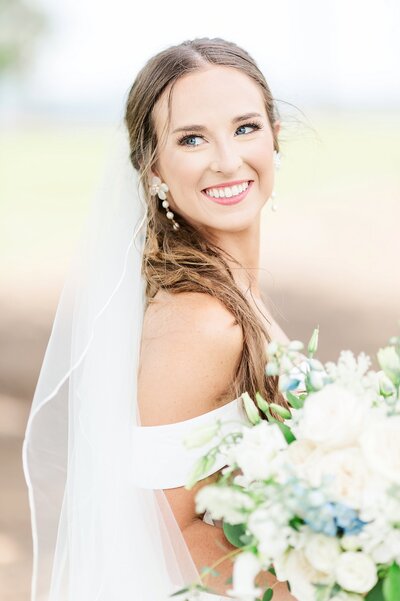 Bride looking over shoulder | Alabama wedding photographer Amanda Horne