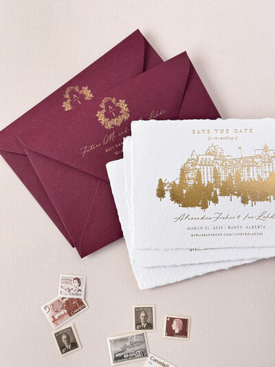 Luxury save the date card with gold foiled custom venue illustration and fine art typography