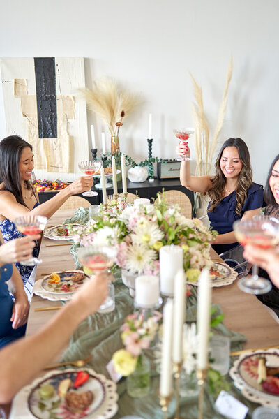Group of women hosting a wine  and dinner event