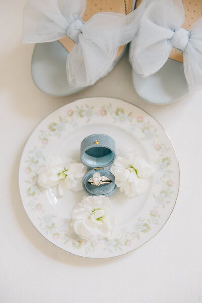 wedding ring in a blue ring box