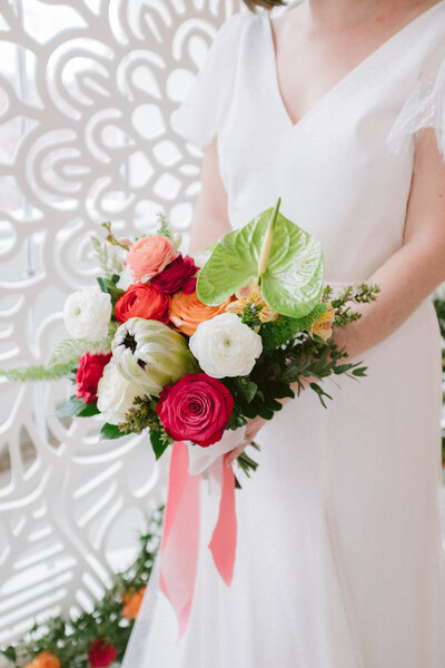 A Bride holding an elegant wedding bouquet