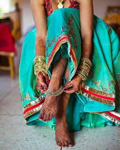 Beautiful feet and hand henna of bride
