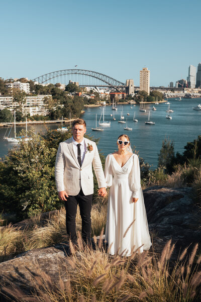 Candid photo of newlyweds laughing during their Sydney wedding reception
