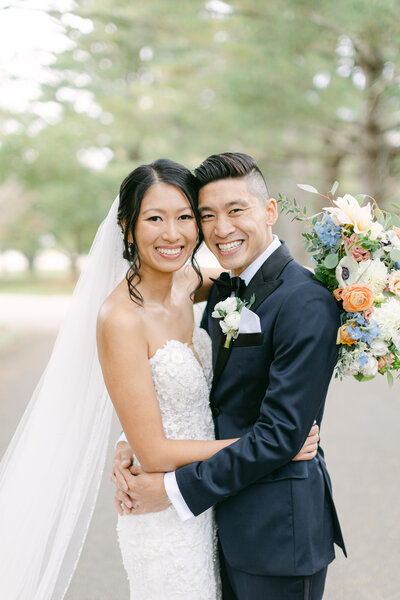 Bride and groom walk up memorial steps at their DC wedding