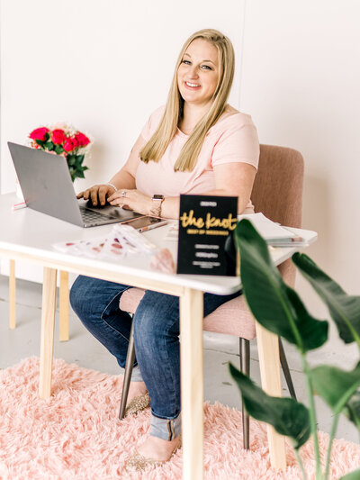 Heather sitting at a desk