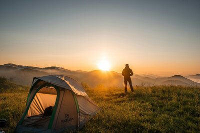 Person camping as a way to support their mental health