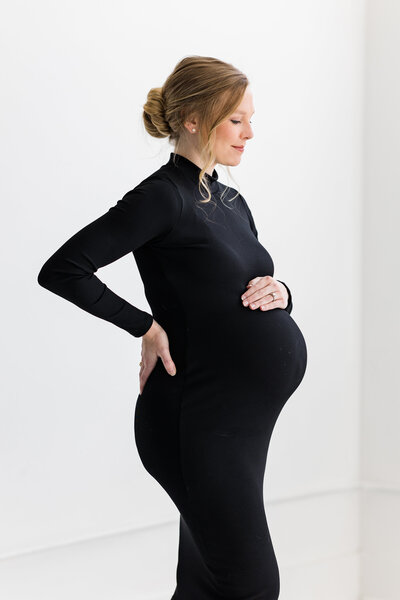 pregnant-mother-in-fitted-black-dress