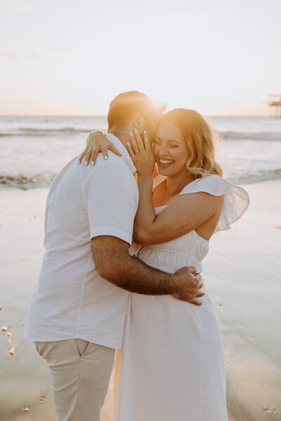 Natural Candid Documentary Family Maternity Baby Pregnancy Announcement Photo shoot at La Jolla Windansea beach at sunset - Couples Mom and Dad San Diego Maternity Photographer