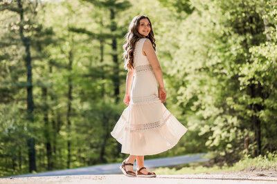 Girl walking in white dress | Senior Portraits