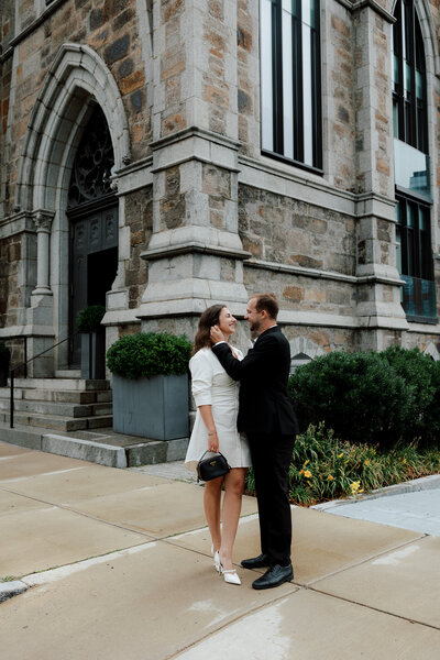 couple kissing under an umbrella