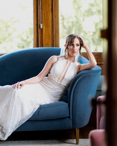 The bride relaxing in the bridal suite before her wedding in Rochester, NY.