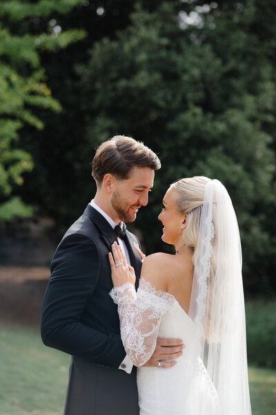 Manor by the Lake Couple Portrait by Cotswolds wedding photographer