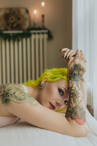 Tattooed boudoir model