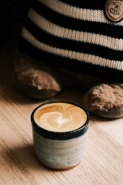 Specialty coffee and tea served in the Petit Play Café lounge
