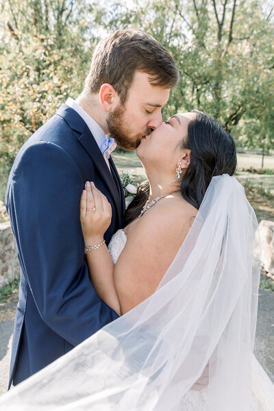 Bride and groom kissing