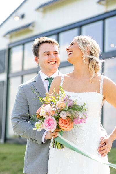 bride and groom about to kiss