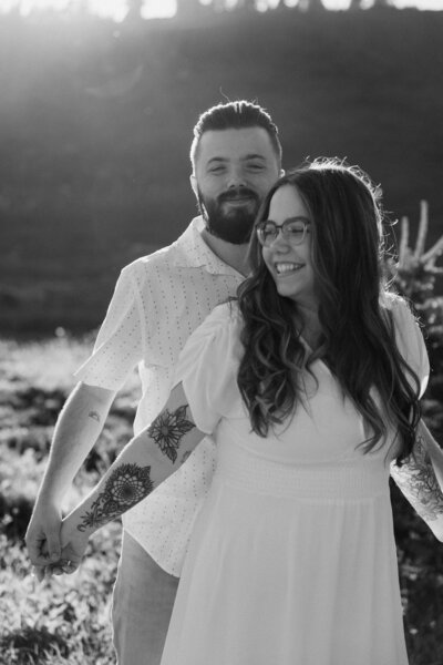 Rainy day elopement couple overlooking the Oregon coast