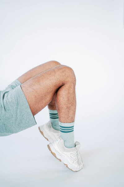 mans lower half with pointed toes