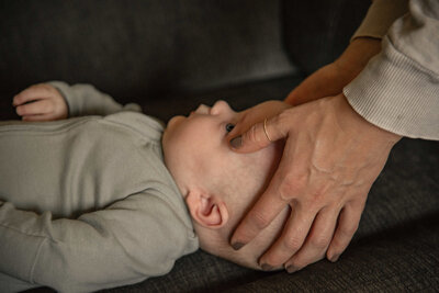 craniosacral therapist working with infant