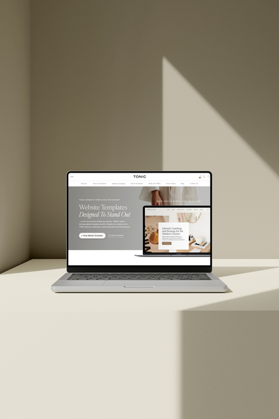 A laptop mockup showing Showit website templates from Tonic Site Shop, designed for creative entrepreneurs, copywriters, and service providers 