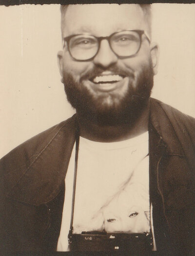 A Ruggedly Handsome Wedding Photographer who shoots on film and has lost 50lbs since this photo was taken.