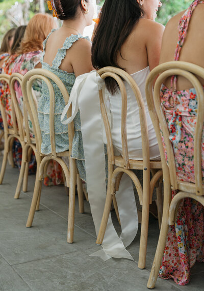 Bride and guests sitting at reception table taken by jacksonville fl wedding photographer, Shelby Ann Photos