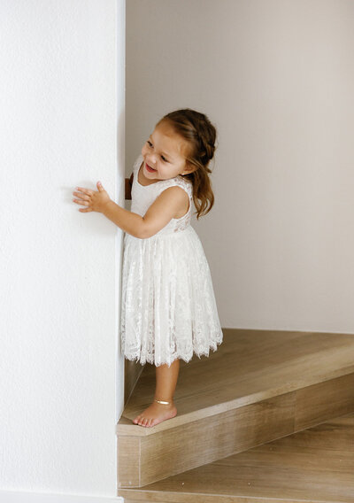 Adorable flower girl in a lace dress at Kelly and Rafael’s destination wedding in Islamorada.