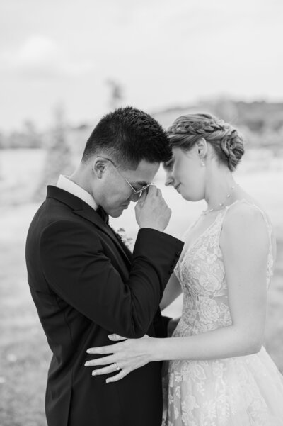 An emotional groom during a first look.
