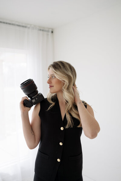 head shots with camera in photography studio