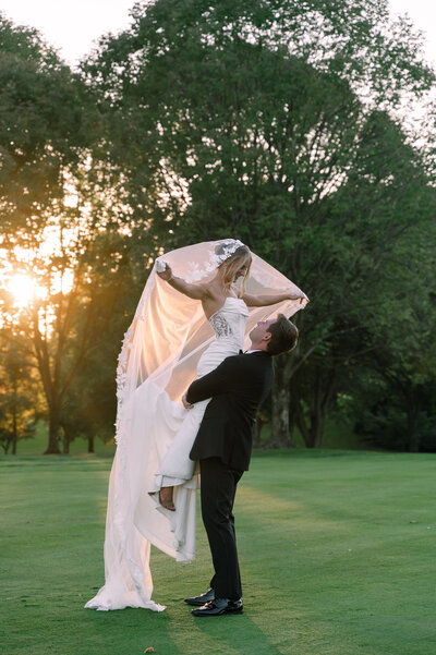 Kentucky bride and groom. Bride and groom ceremony flower petal toss by kentucky wedding photographer