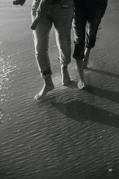 Barefoot children walking on the beach — blog feature on building resilience and support systems for kids living abroad