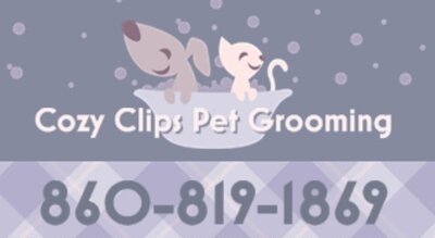 A cartoon dog and cat in a bathtub with the words Cozy Clips Pet Grooming in white, in front of the bathtub.