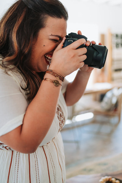 photographer smiling and shooting