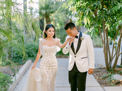 Bride and groom walk up memorial steps at their DC wedding