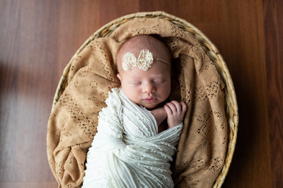 Newborn photography can be vast.  Lifestyle, portrait, candid baby photography is everywhere and we embrace all of it.  Posed, non posed, natural light, we love it all!