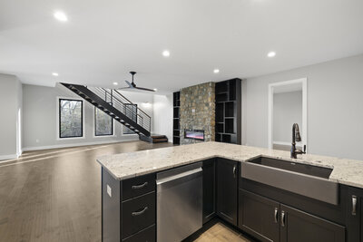 A large kitchen with beautiful counter tops