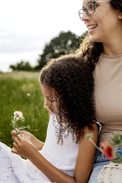 mom with her daughter outdoors in plano texas