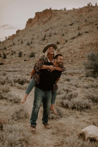Couples photo of Jena and Zach in the desert