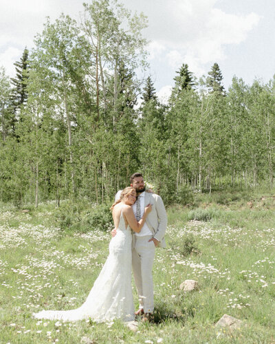 Bride and groom embrace during Durango, Colorado wedding
