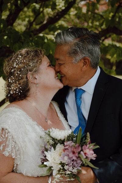 Loving couple brushing their noses together 