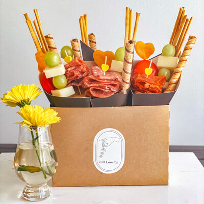 individual servings *minimum ½ dozen  Each 10-inch cone of love includes:  - Selection of meats - Cheeses - Olives/cornichons  - Seasonal fruit - Crackers - Something sweet