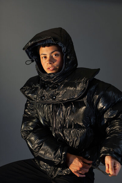 Model wearing black ski jacket