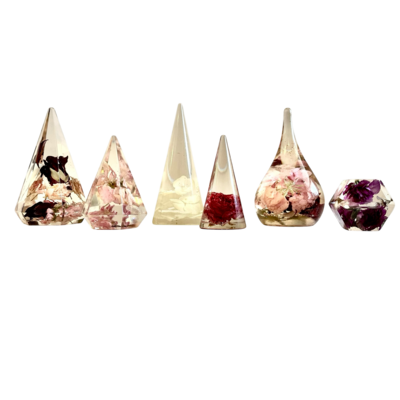different resin ring holders in a variety sizes next to each other 
