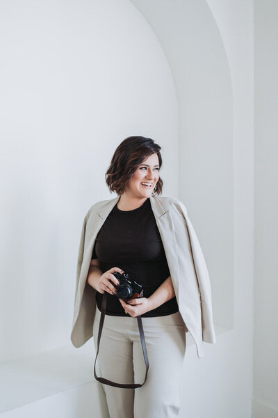 woman holding camera
