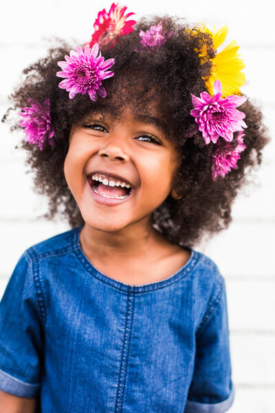 little girl with flowers in her hair