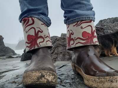 Close up of boots on a Local surfer organisation volunteer 
